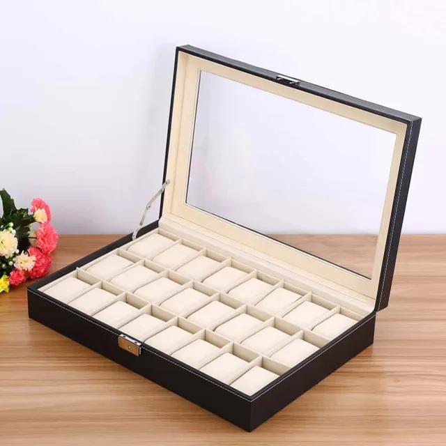 Black twenty-four slot watch box open on a white background