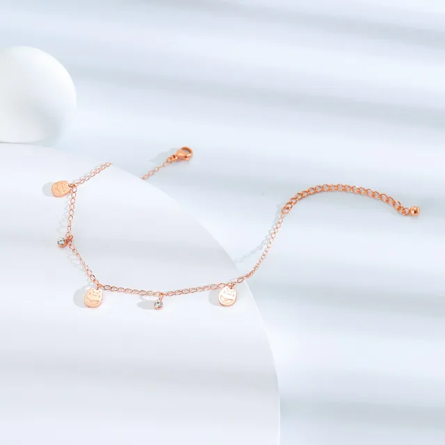 Rose gold disc anklet, close view