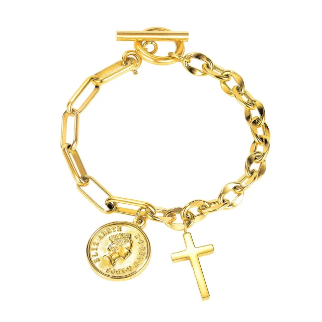 Gold coin and cross bracelet with a toggle clasp, flat lay