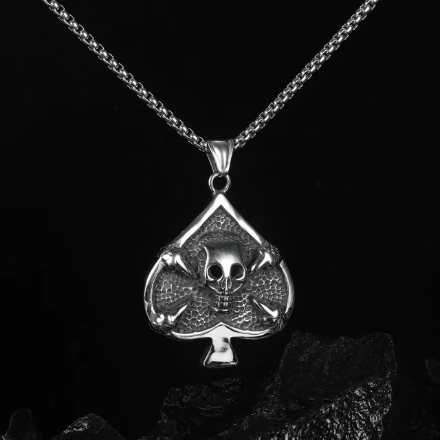 Silver spade skull pendant, close view on black
