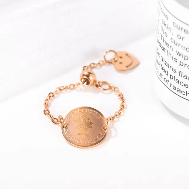 Rose gold chain disc ring, close view