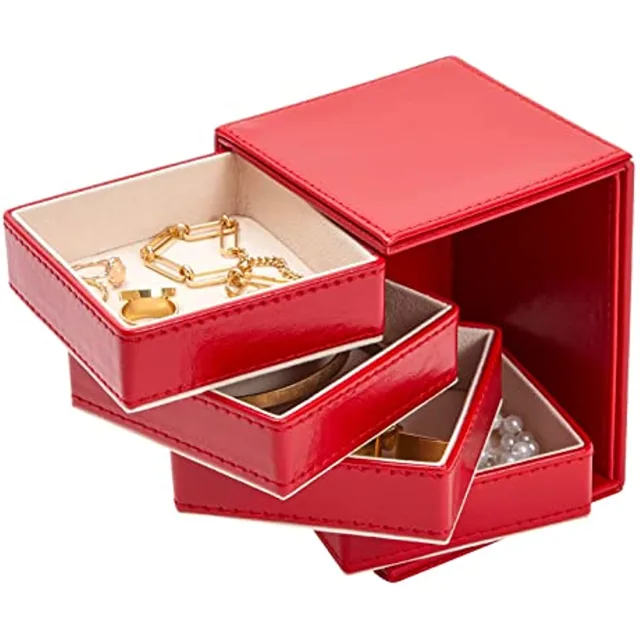 Red jewelry tower with its drawers swivelled open