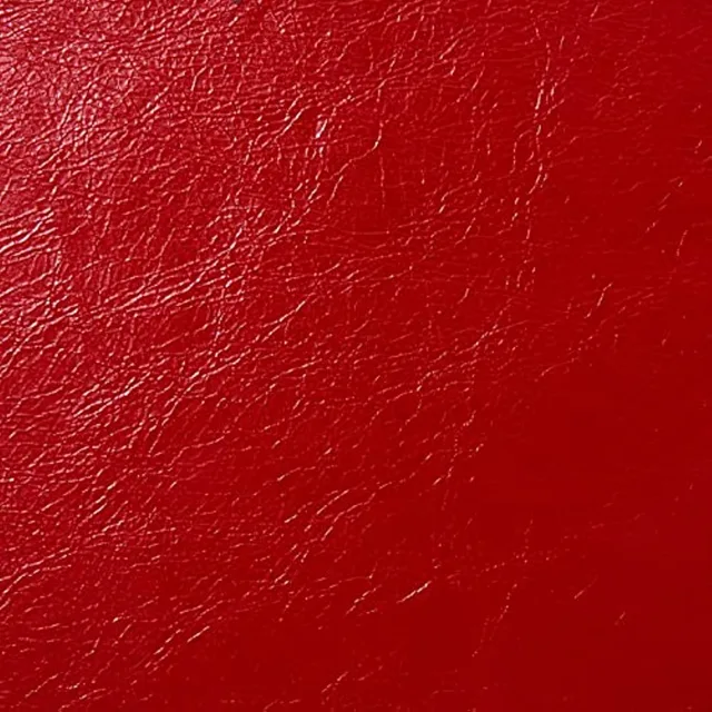 Close view of the red faux leather grain