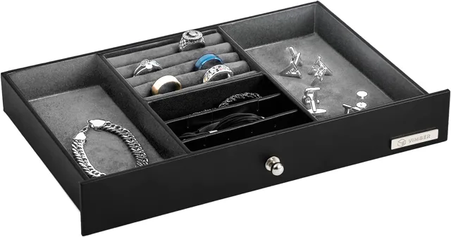 Black storage box opened to show the watch deck and pull drawer