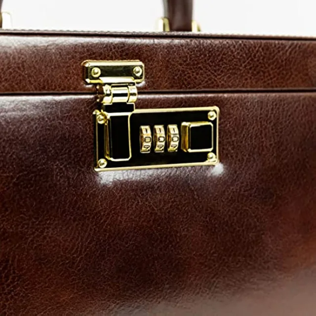 Close view of the brown leather grain and gold combination lock
