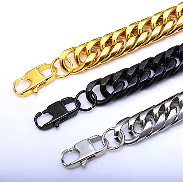 Close view of gold, black and silver lobster clasps on Cuban chains