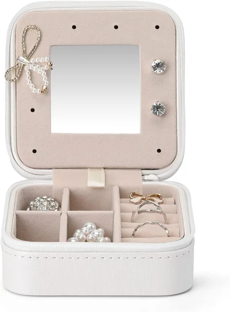 White jewelry case front view with the stud panel raised