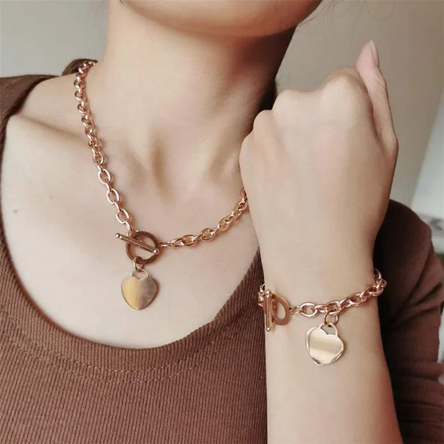 Close view of the rose gold heart pendant worn on the neck