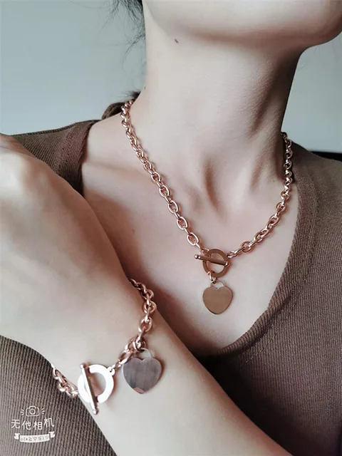 Model wearing the rose gold heart pendant chain