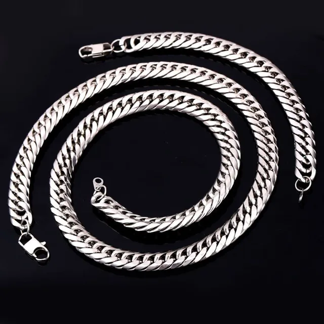 Silver Cuban link chain coiled in a spiral