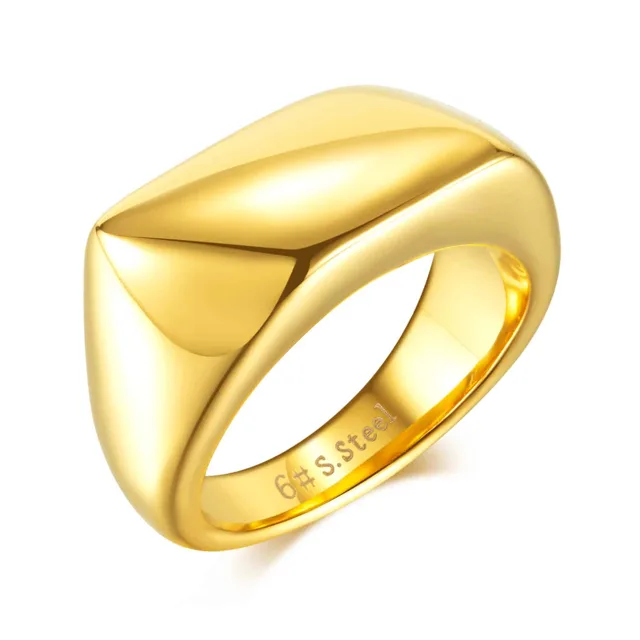 Gold dome ring close-up showing the inner engraving