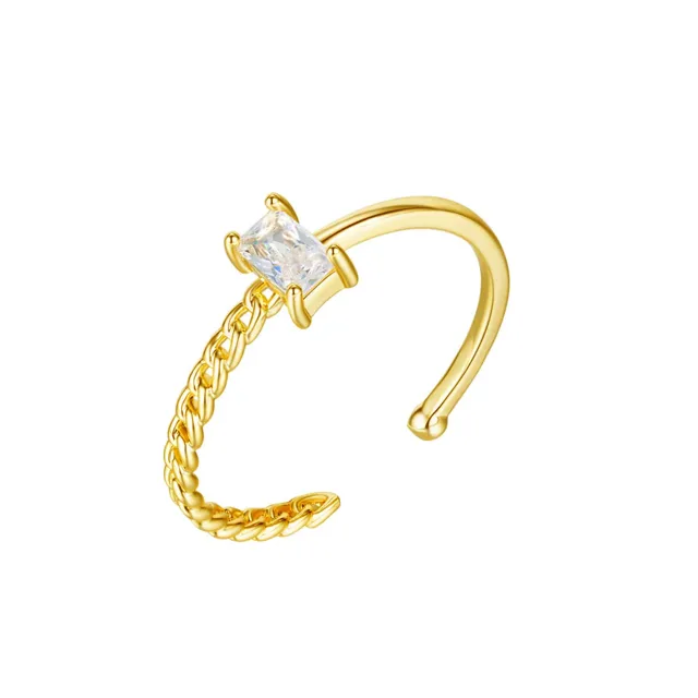 Gold open ring with a star zircon accent on white