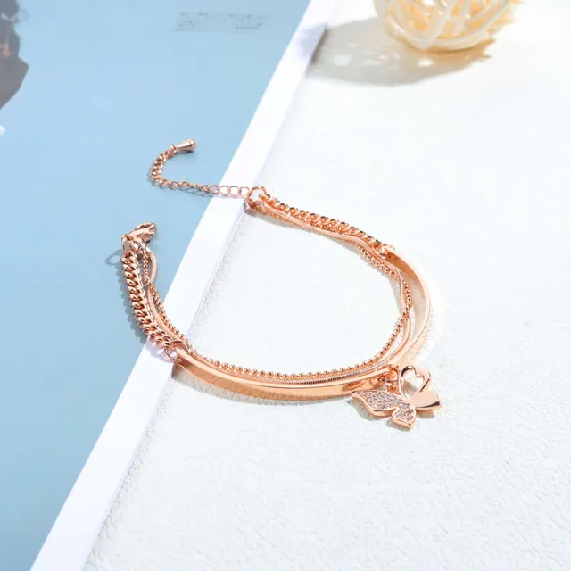 Butterfly bracelet styled on a blue card
