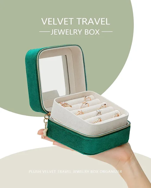 Green velvet case open held in a hand