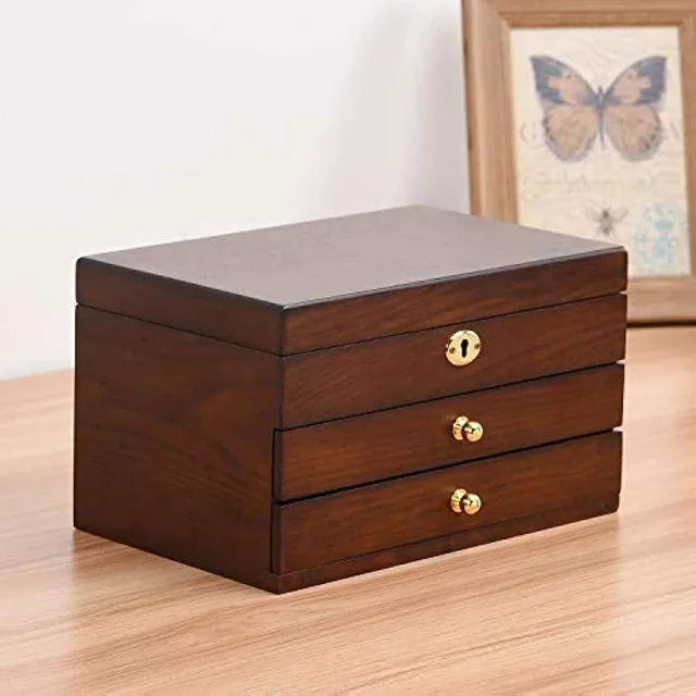 Walnut chest closed, front view, three brass knobs