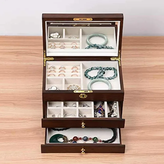 Wooden chest open with all three drawers extended