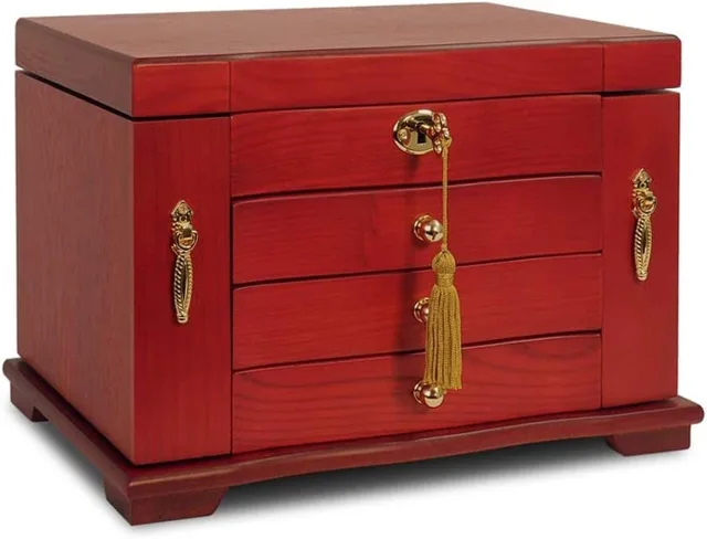 Cherry red chest closed, front view, three drawers and tassel lock