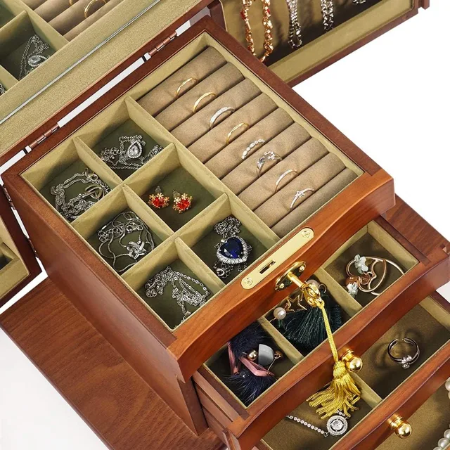 Top-down view of open drawers filled with jewelry