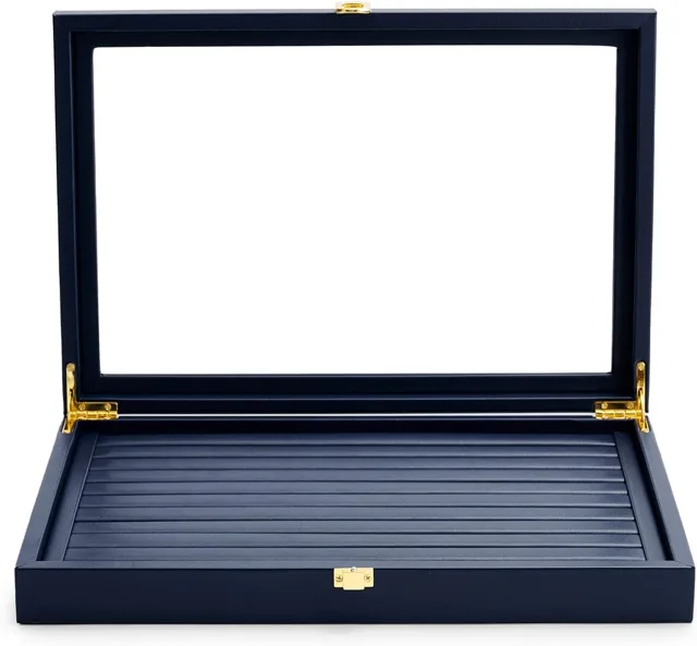 Open navy jewelry display case with glass lid on a white background