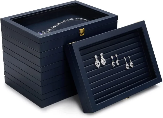 Multiple navy jewelry cases stacked into a tower display