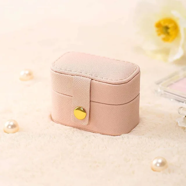 Blush mini case closed, front view, gold clasp