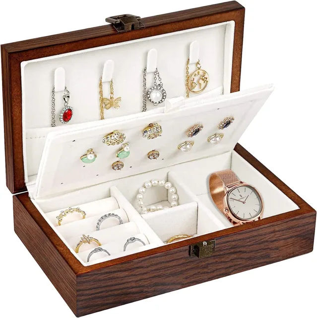 Walnut wood-grain travel box open with a stud panel and watch