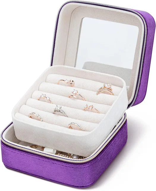 Purple velvet case open showing the ring rows