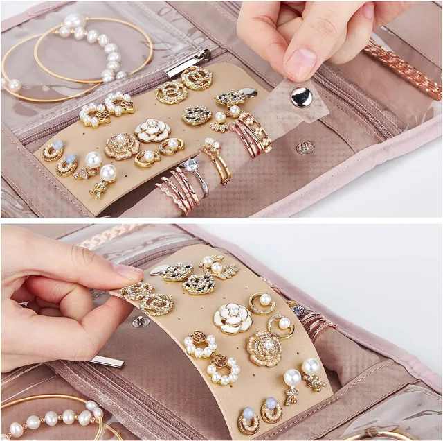 Hand lifting an earring from the pink organizer panel
