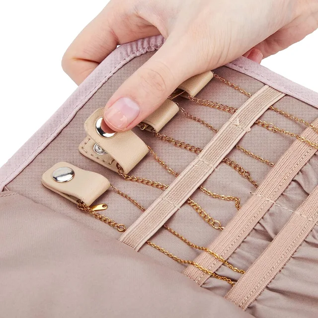 Close view of the snap clip on a pink organizer flap