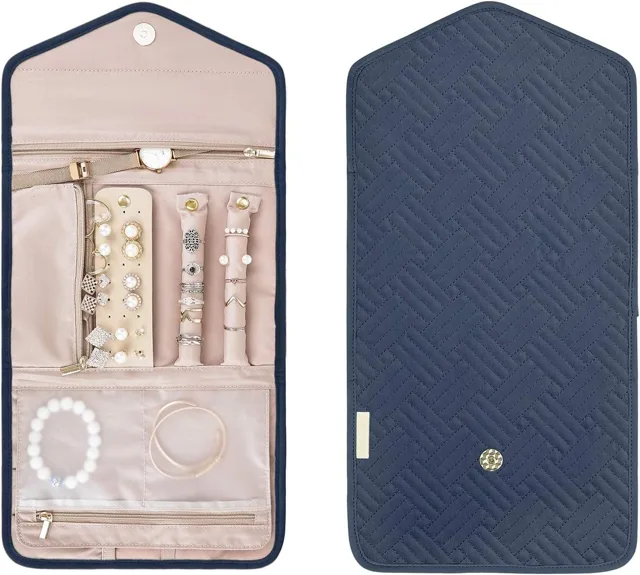 Navy jewelry roll open beside its folded envelope case