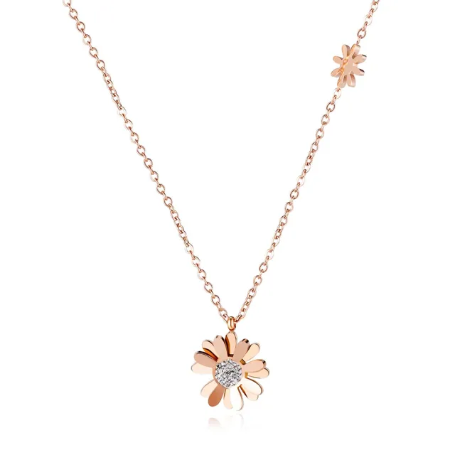 Rose gold daisy pendant necklace, close view