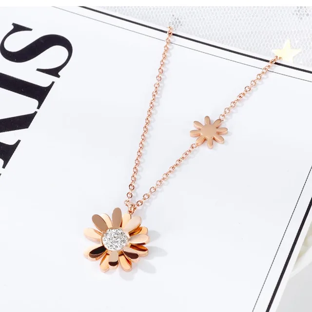 Daisy necklace styled on a magazine