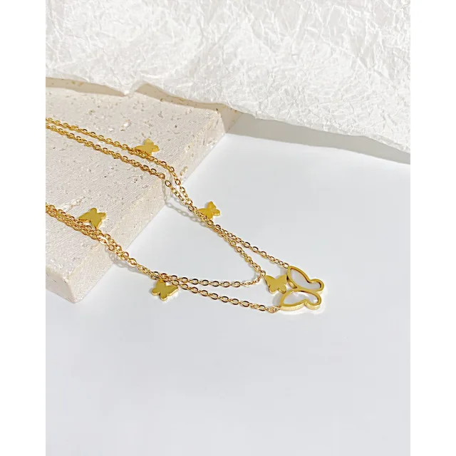Butterfly charm anklet, close view