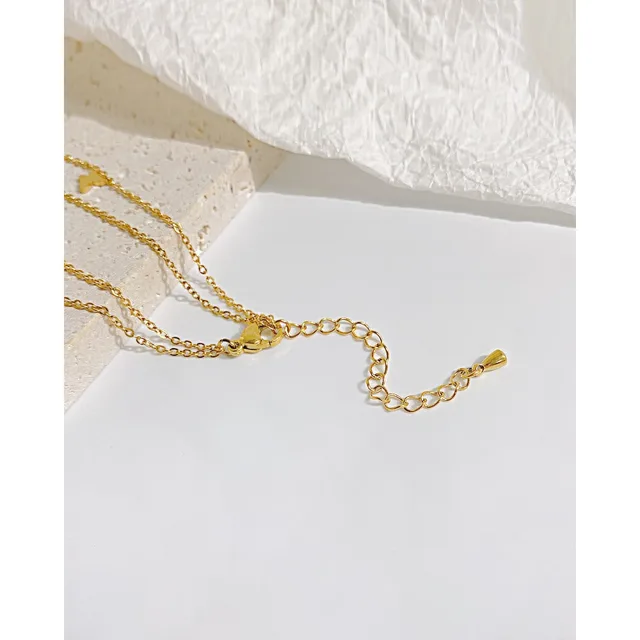 Gold anklet chain, detail view