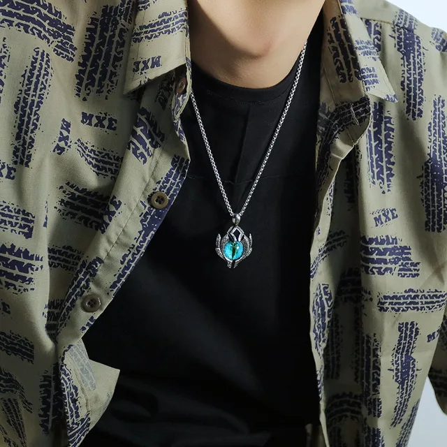 Model wearing the evil eye pendant, second angle