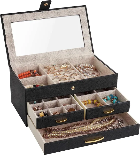 Cream jewelry box open with drawers extended and filled