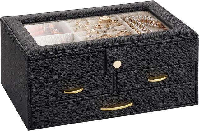 Black jewelry box closed showing a necklace through the lid