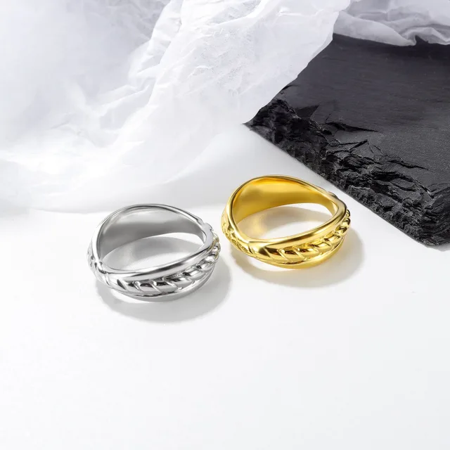 Gold and silver braided rings side by side