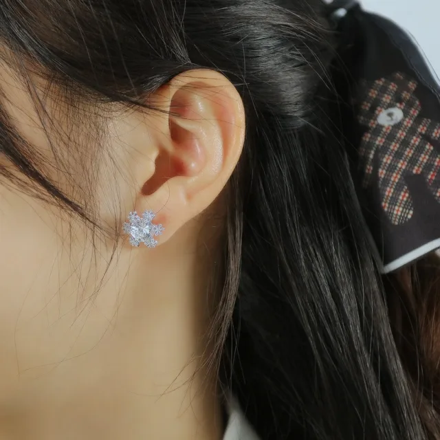 Model wearing the crystal snowflake stud