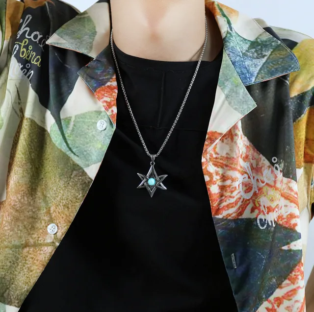 Model wearing the star pendant, second angle