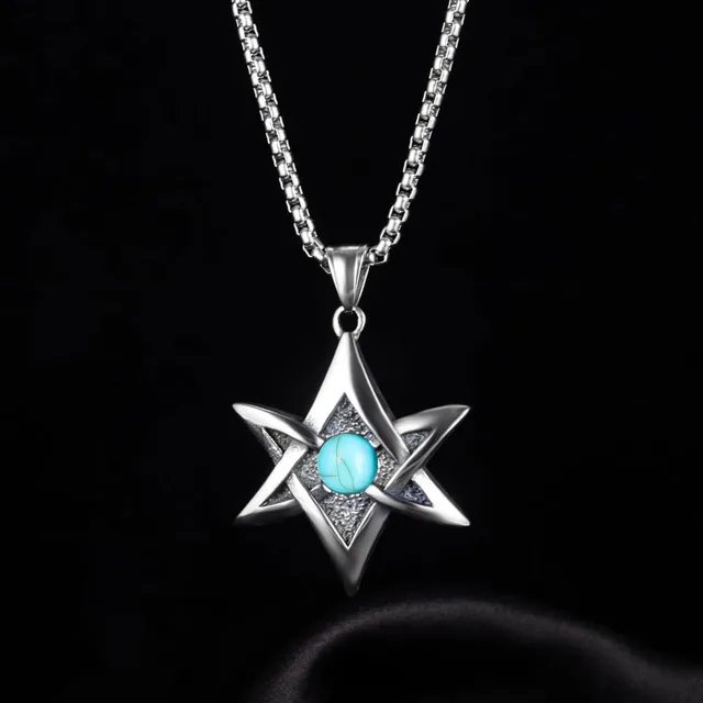 Star pendant on black, straight-on view