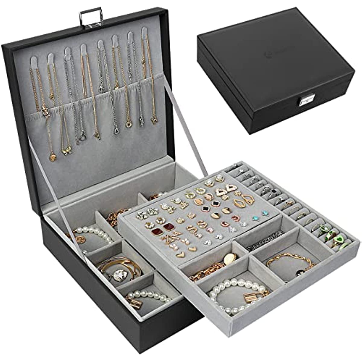 Black two-layer jewelry box open showing necklace hooks and tray