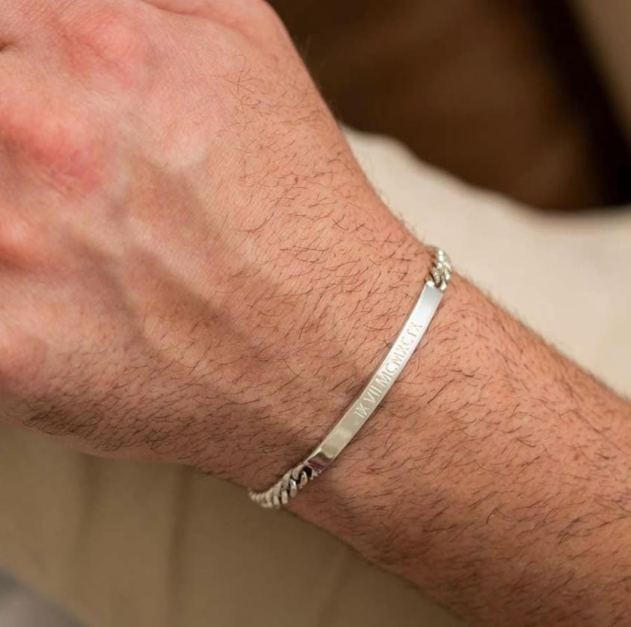 Stainless steel bracelet with a curved engraved name plate, couple gift style