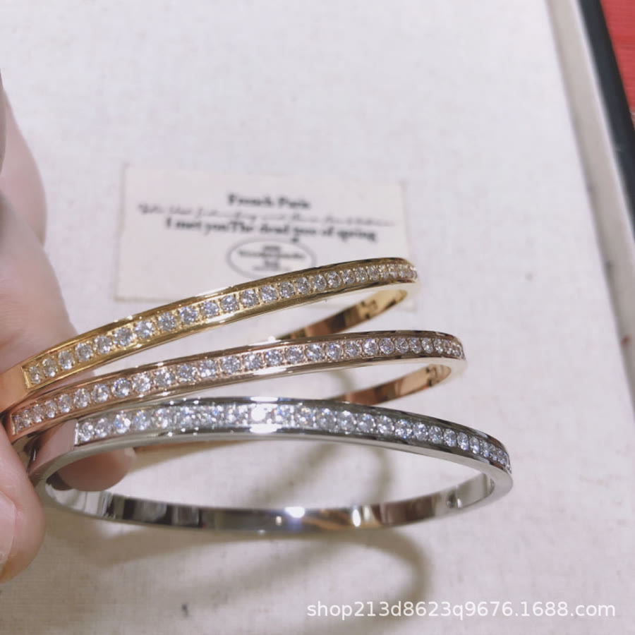 Stainless steel bangle fully set with zircon stones, full-star style