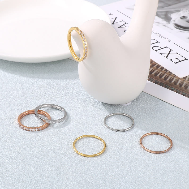Stainless steel openwork ring set with zircon stones