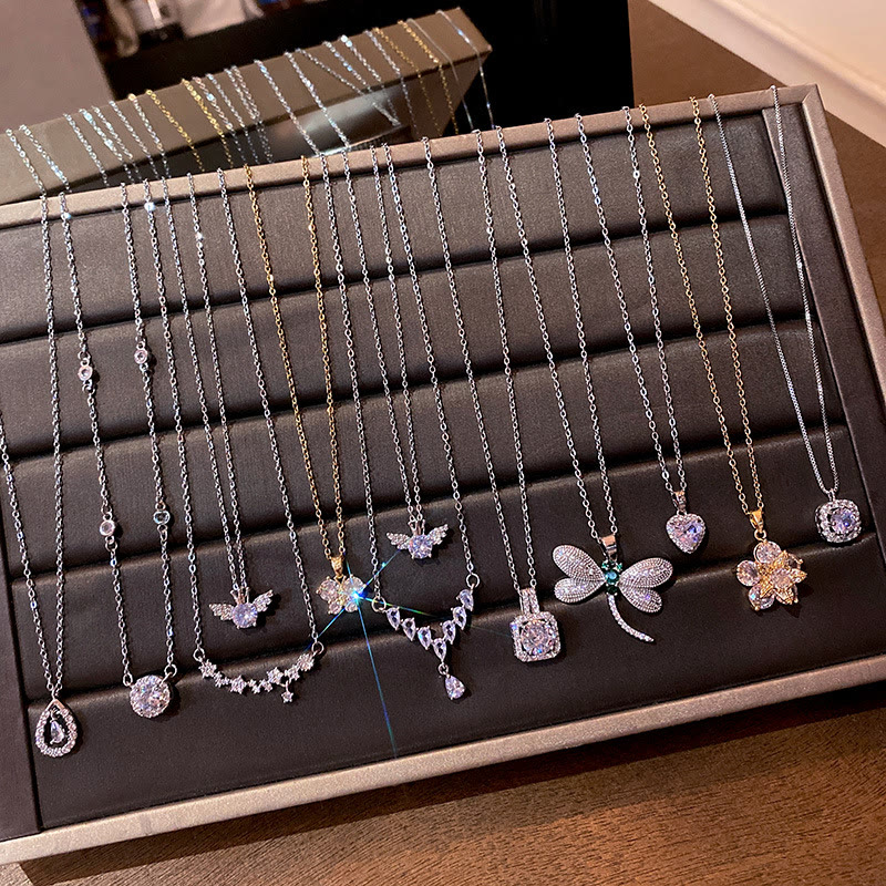 Display tray of titanium steel chain necklaces with micro-inlay zircon pendants