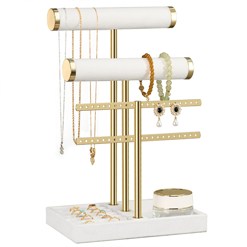 white leather jewelry storage tower with bracelet holders