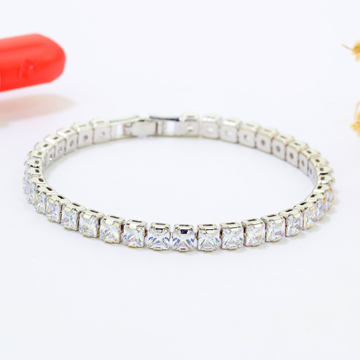 Silver square CZ tennis bracelet lifestyle product photography